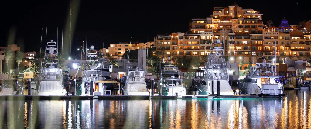 Nighttime view of the marina and skyline of Cabo San Lucas