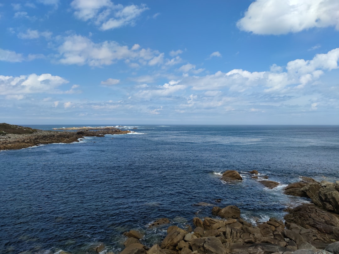 A stunning view from a condo balcony overlooking the ocean