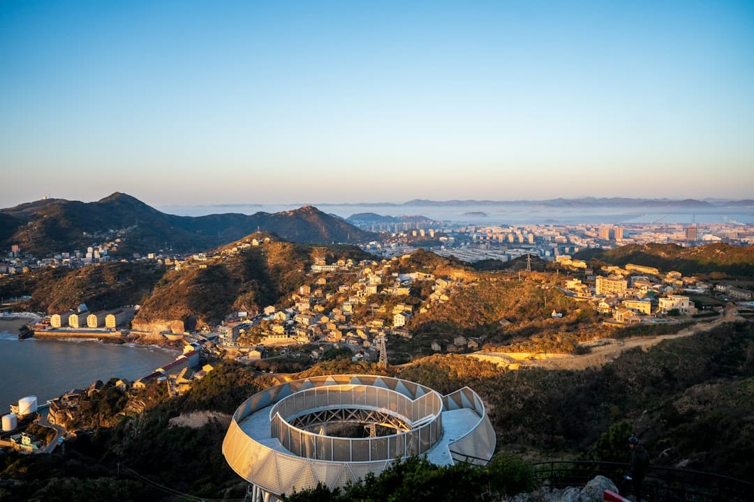 The expansive patio of a private luxury villa in Los Cabos, featuring comfortable seating and a panoramic view of the Pacific Ocean, illustrating the appeal of villa living.